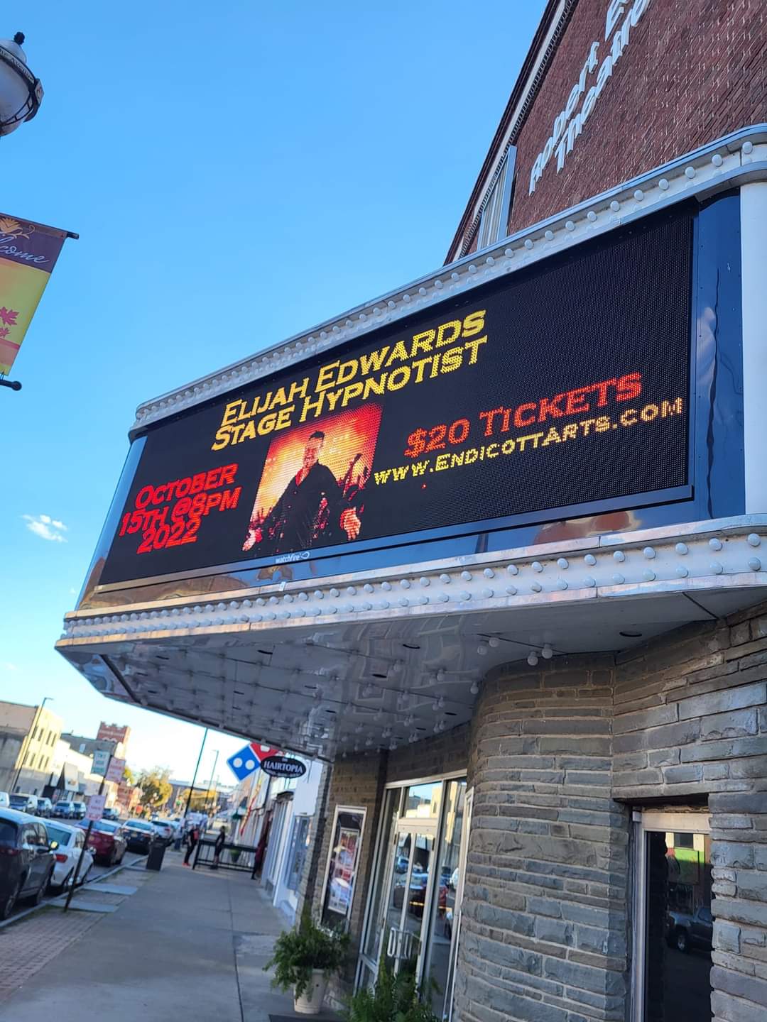 Theater marquee displaying Elijah Edwards live show promotion outside the venue