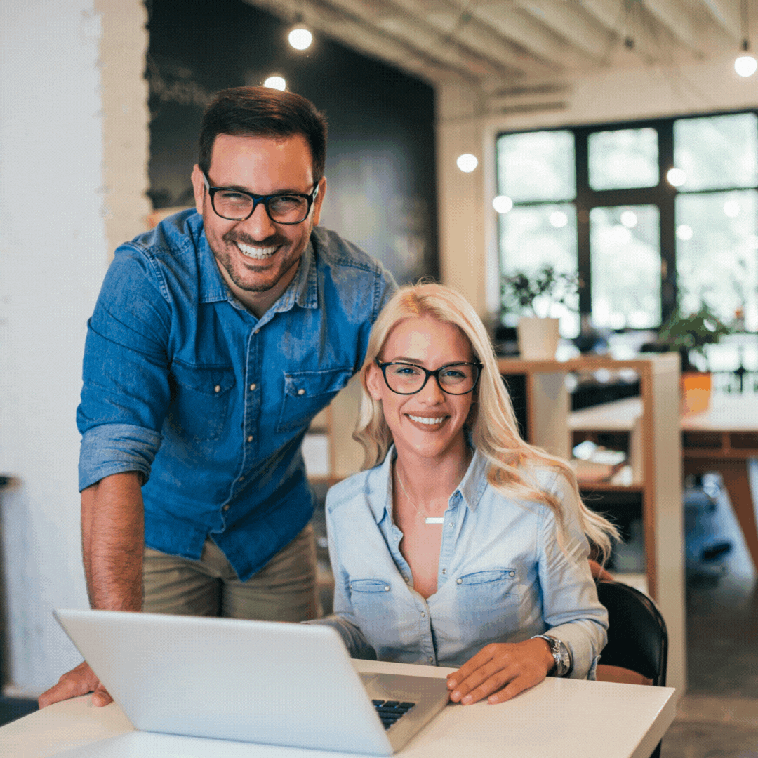 A diverse group of local business owners—contractor, wellness provider, and agency leader—stand together in a sunlit, modern workspace, smiling confidently. The background features subtle digital marketing icons, conveying growth and community.