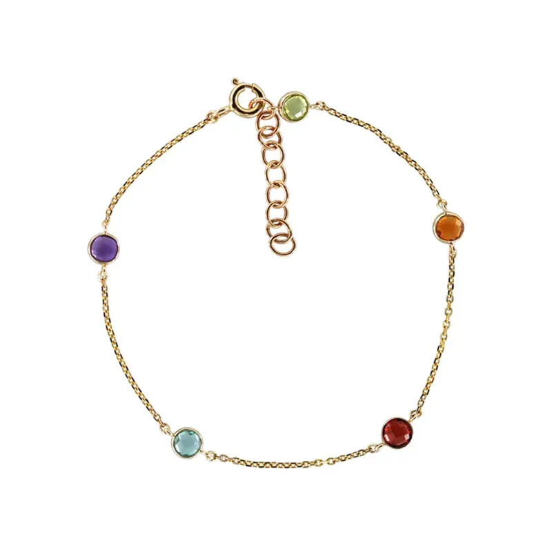 A 14k yellow gold bracelet designed with five gemstone charms strung on a gold chain