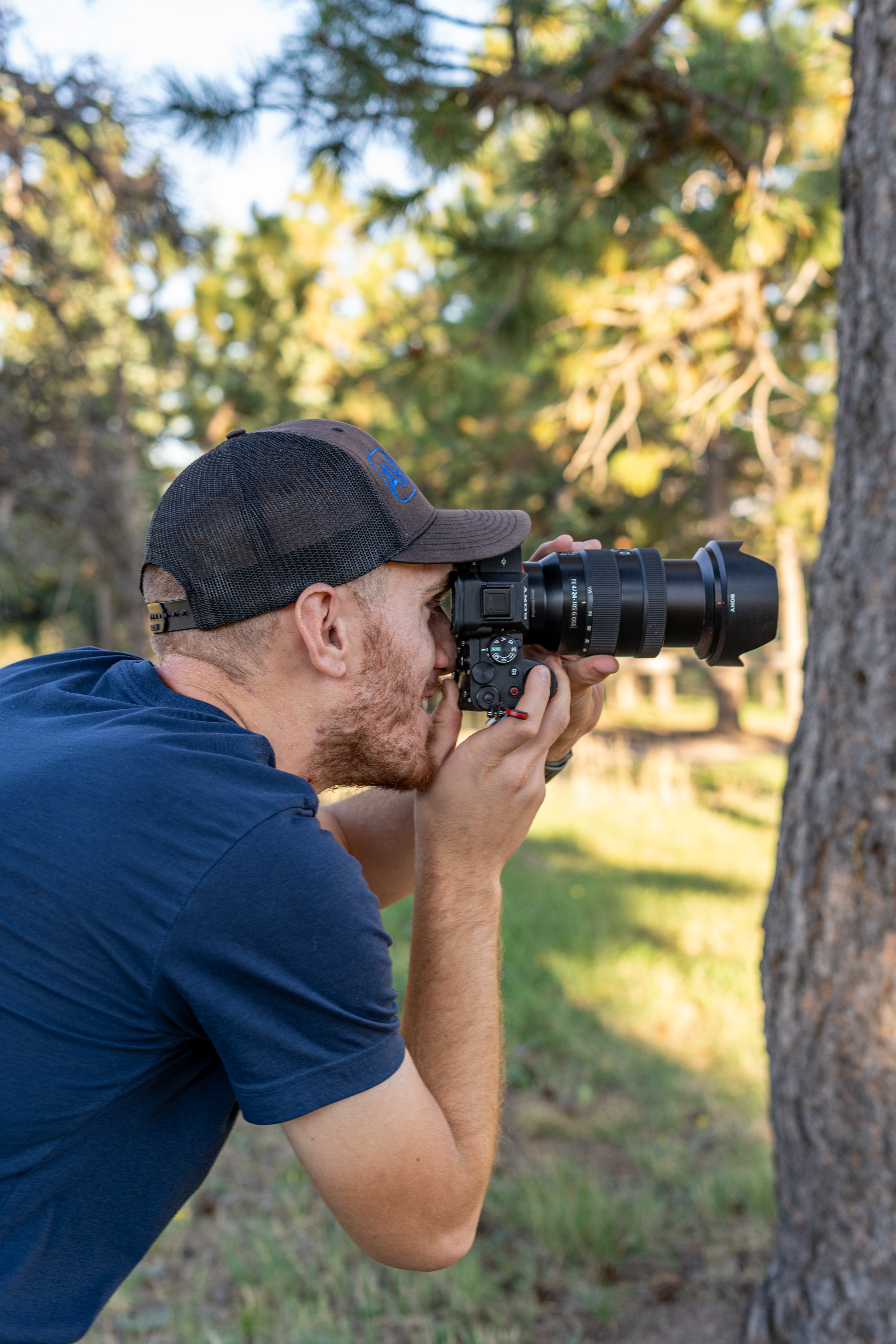 Alex Vassios taking pictures with his camera