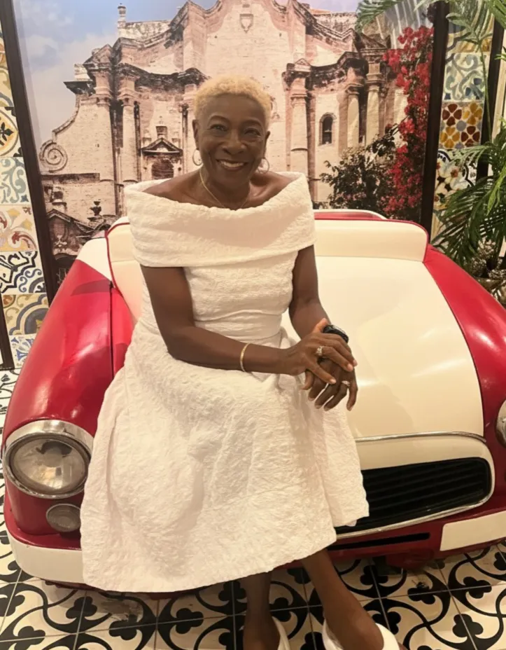 Queen G’s Restaurant staff serving authentic Jamaican food in Montego Bay