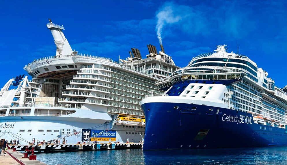 Celebrity and Royal Caribbean cruise ships docked next to each other at Cococay