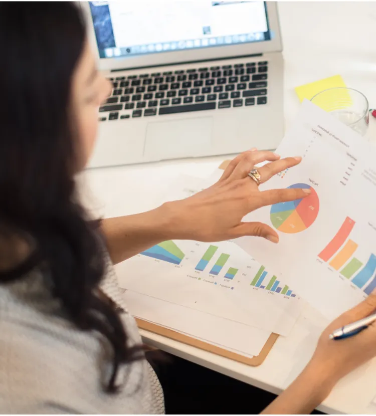 Executive examining key performance data for leadership success