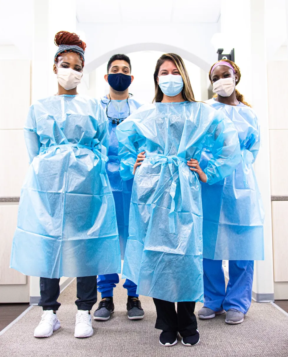 a close-up of a woman and a man holding hands