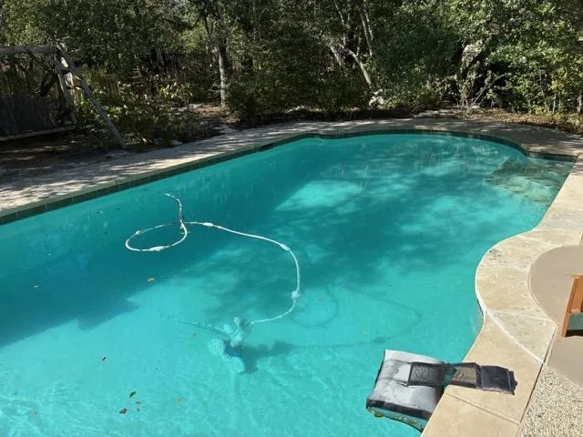 Clear blue pool water after CYA correction