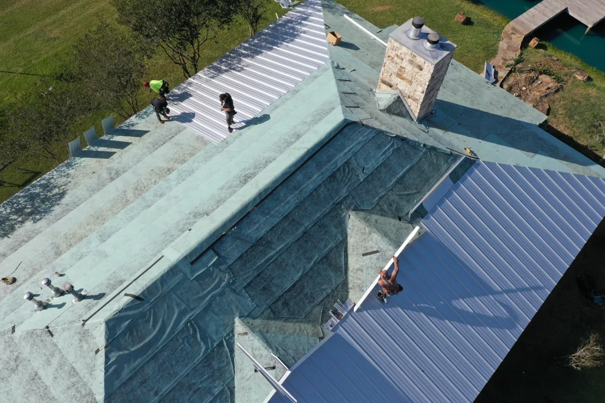 Standing seam metal roof in Hill Country at golden hour