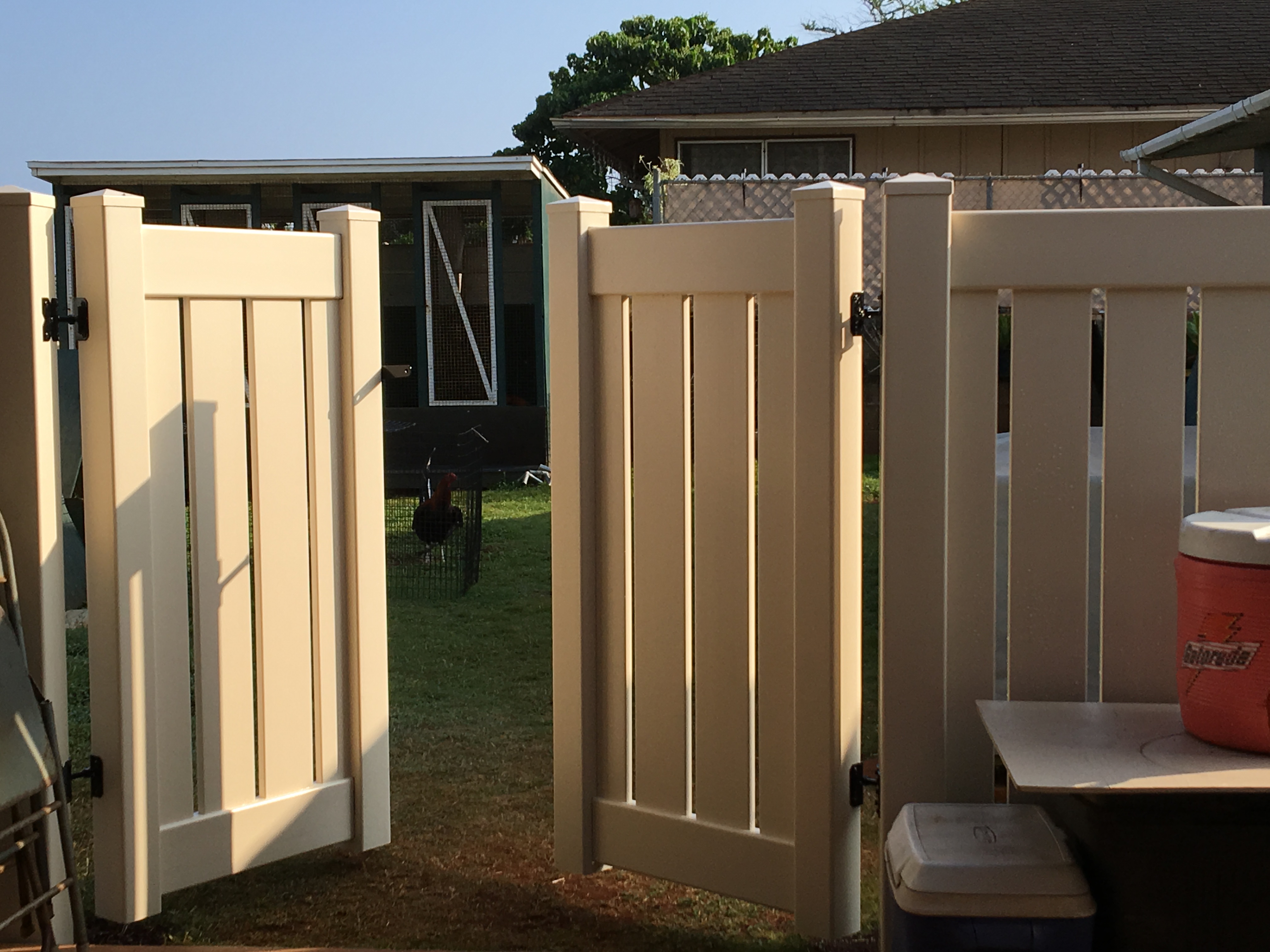 a close up of a fence post with snow in the background
