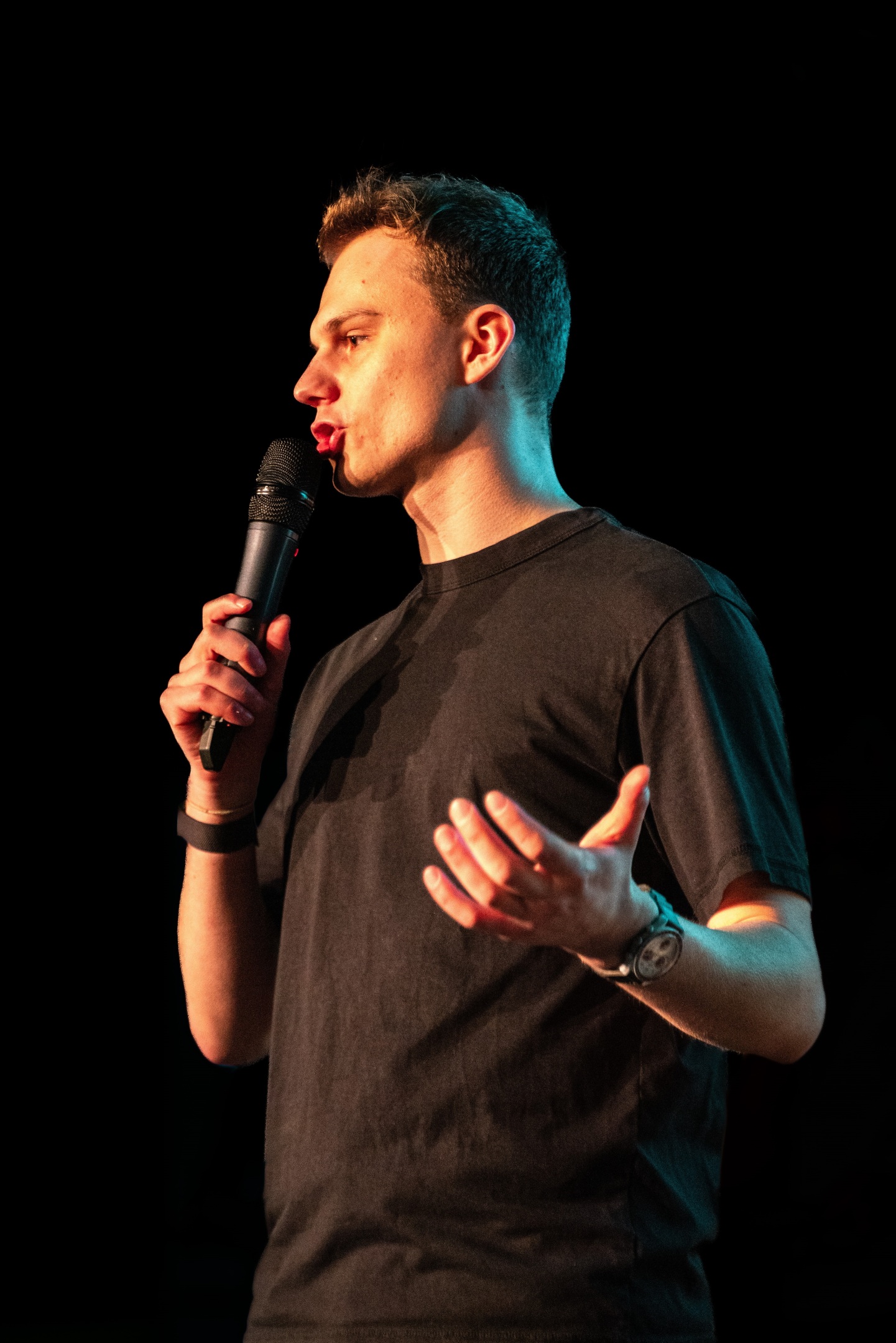 Portrait of a featured speaker — confident, green accents, editorial style