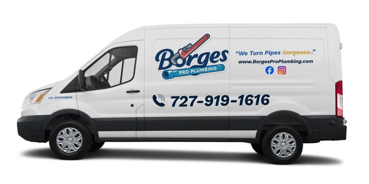 Plumbing van in front of residential home.