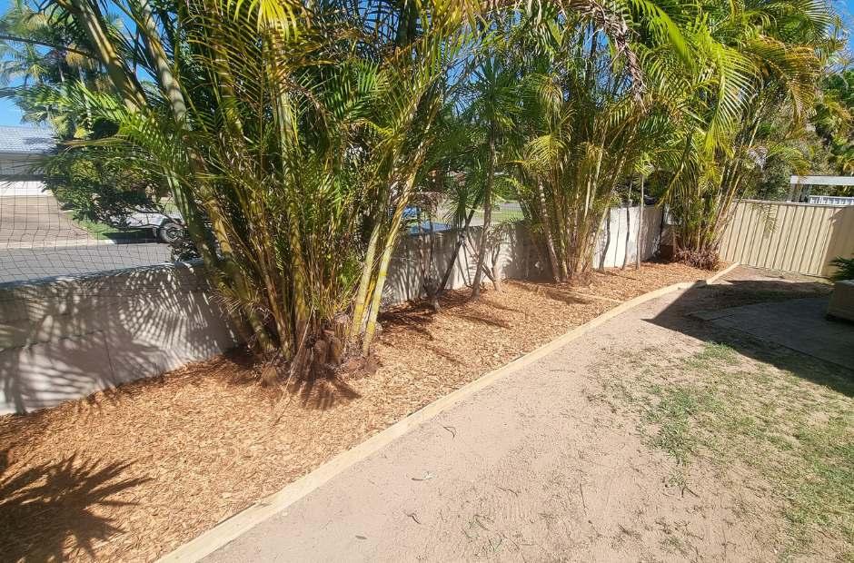 2. Mountain Creek garden tidy up wood edging mulching photo