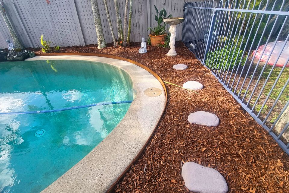 Garden clean-up Sippy Downs after with neat edging and fresh mulch