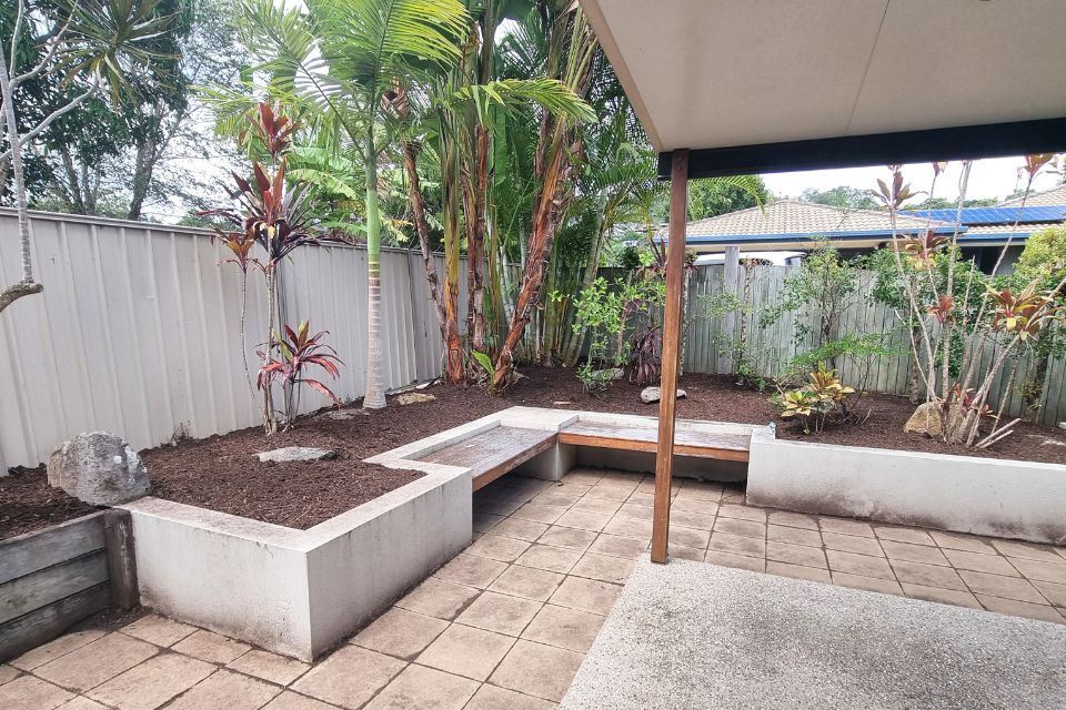 Garden prepared for sale with clean beds and mulch in Buderim