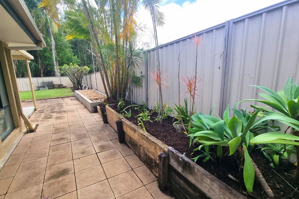 Sugarcane mulch and Cypress Pine mulch applied to garden beds in Buderim