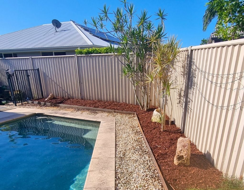 Clean and contained poolside garden in Buderim after garden clean-up