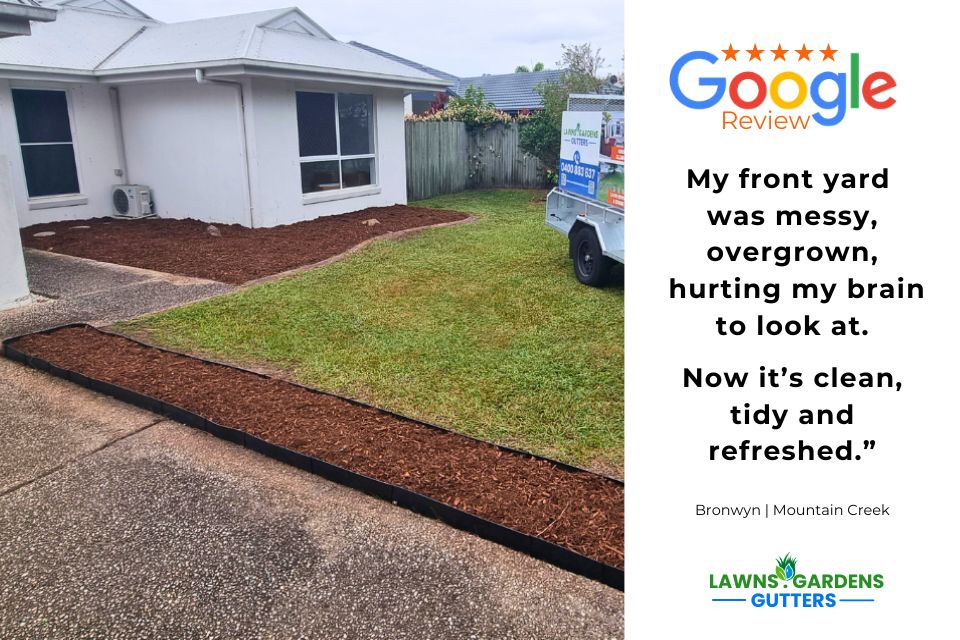 Front yard garden clean-up in Mountain Creek with fresh mulch, defined edges and tidy lawn