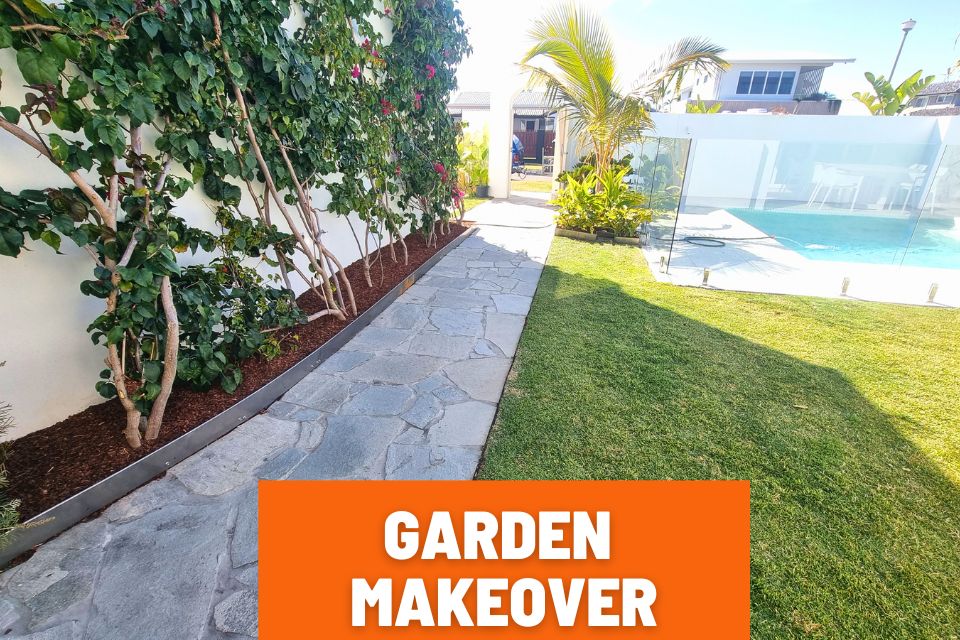 Neat garden after a makeover in Minyama with freshly mown lawn, pruned plants, steel garden edging and fresh mulch