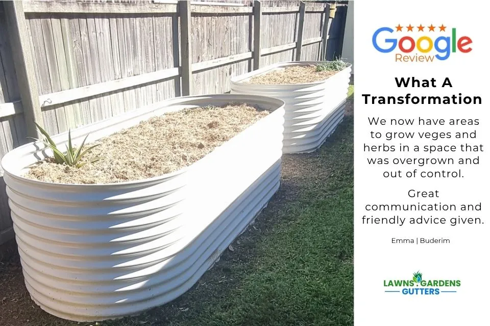 White corrugated metal raised garden beds installed in a Buderim backyard