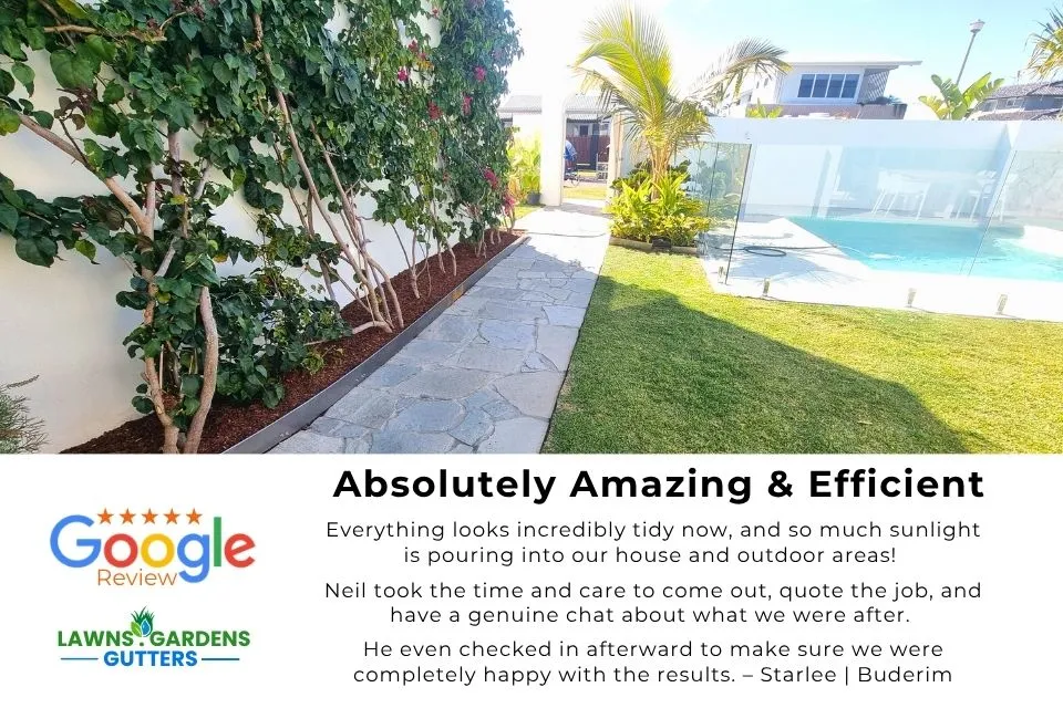 Buderim sloping backyard landscaping with timber retaining wall and hoop pine mulch