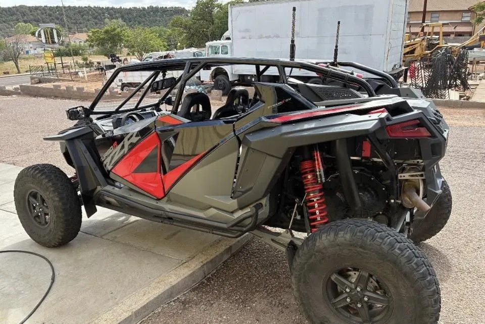 Clean, bright auto shop bay in Payson, AZ showing professional detailing setup