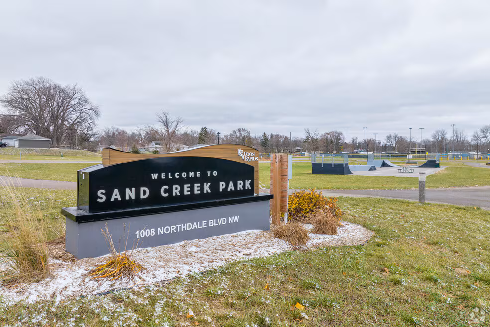 Multi-level cedar deck with seating in Sand Creek neighborhood of Coon Rapids