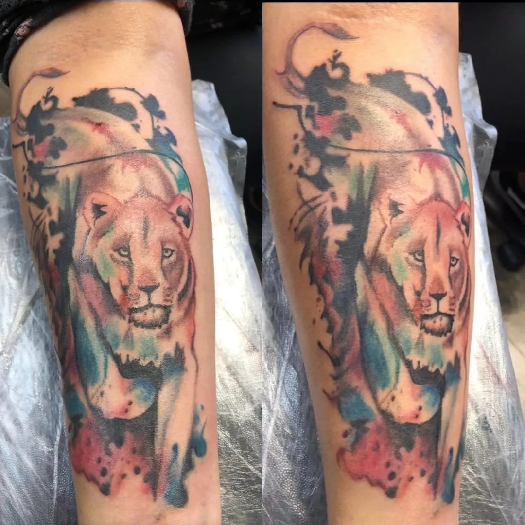 person with tattoo on right arm