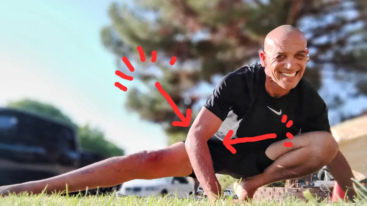 Steve stretching in the grass