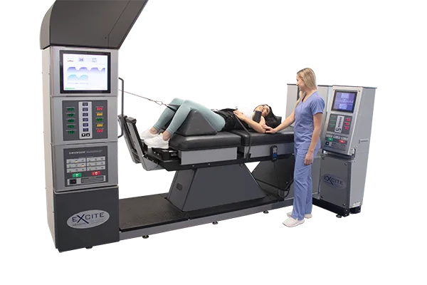 SpineEase 3000 spinal decompression table in a bright clinic room