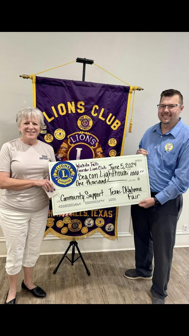 Lions Club making a donation