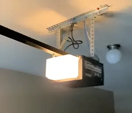 Garage door opener repairs by Spring Kings Malfunctioning Opener