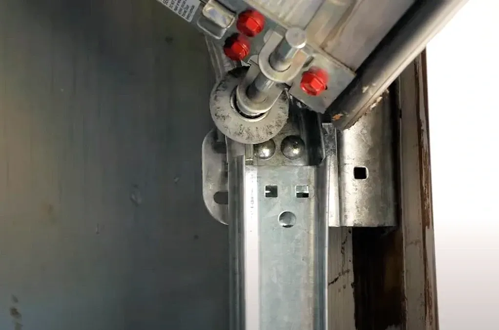 how to fix garage door wheel off track spring kings