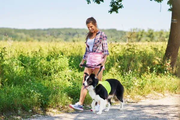 Women walking dog