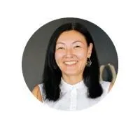a dark haired woman telling about result and ROI for her businessI 