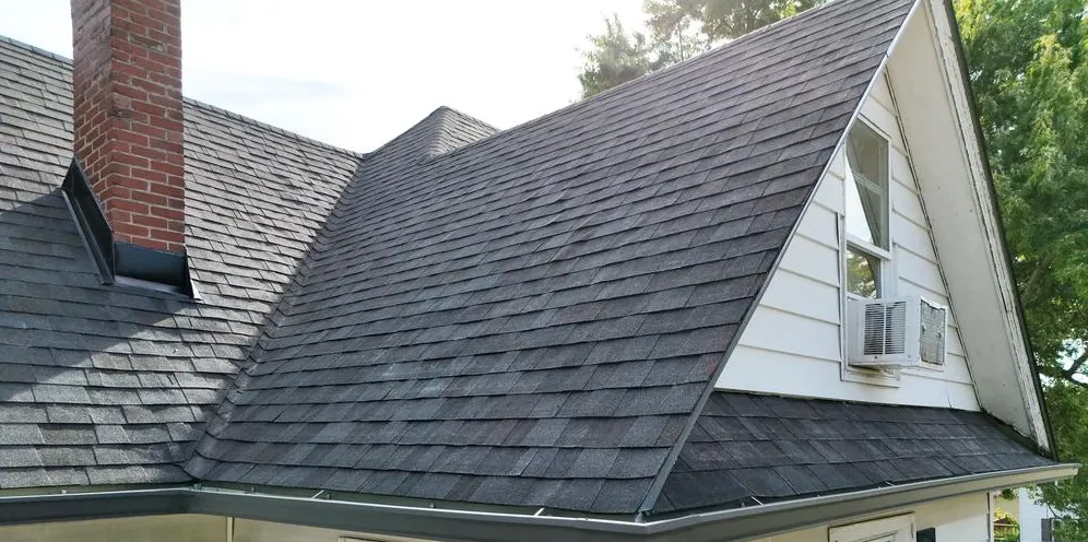 Aerial view of a flawless, newly completed shingle roof installation by Precision Exteriors Inc.