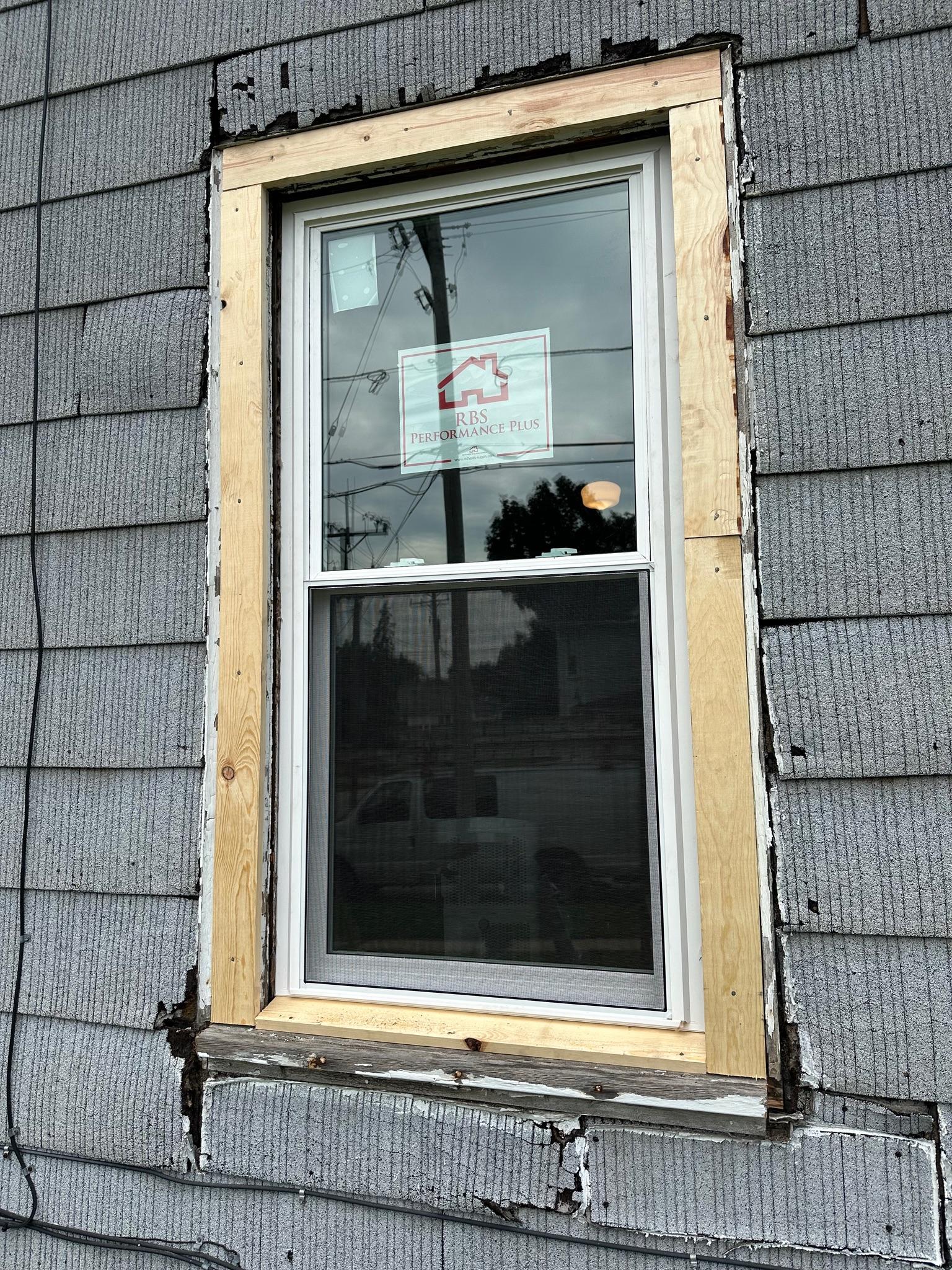 Professionally installed energy-efficient window by Precision Exteriors Inc.