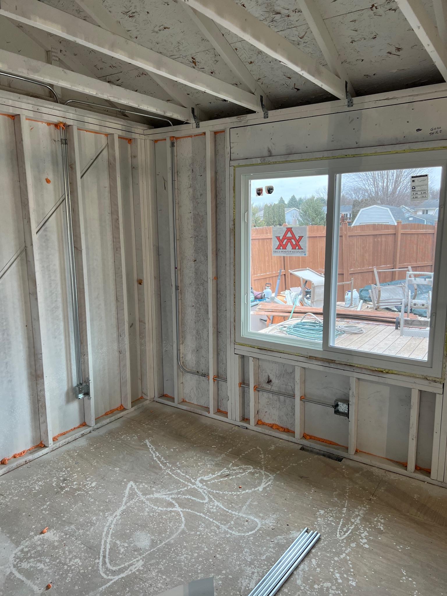 Newly installed bay window unit on a suburban home.