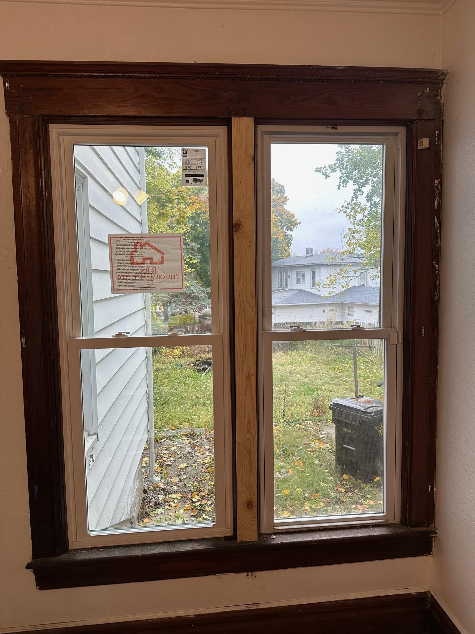 Premium basement window replacement showing proper sealing.