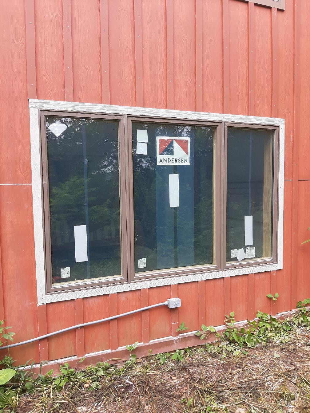 New picture window unit installed on a residential home.