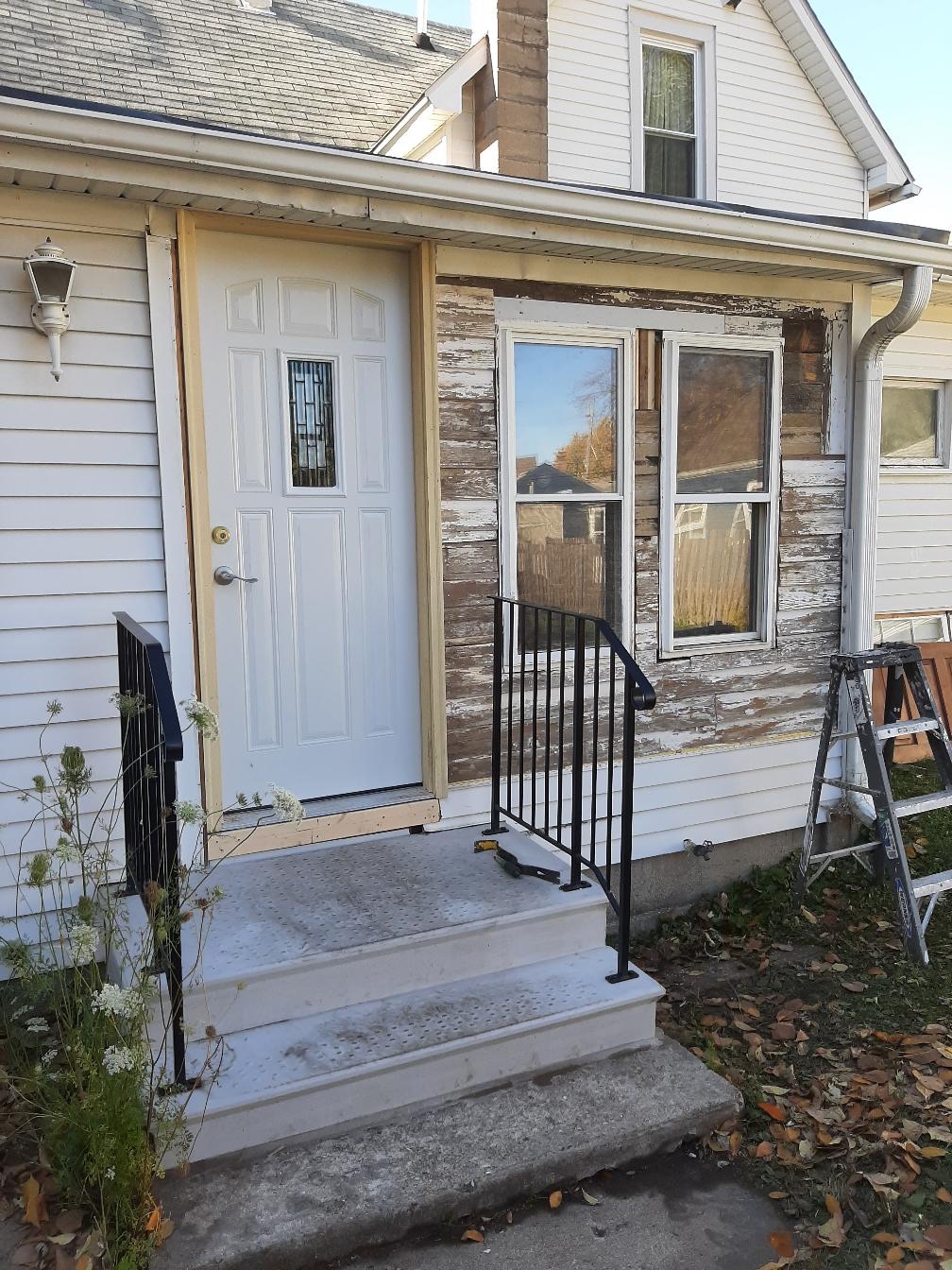 Beautifully updated residential windows completed by Precision Exteriors Inc. in Lena, IL.