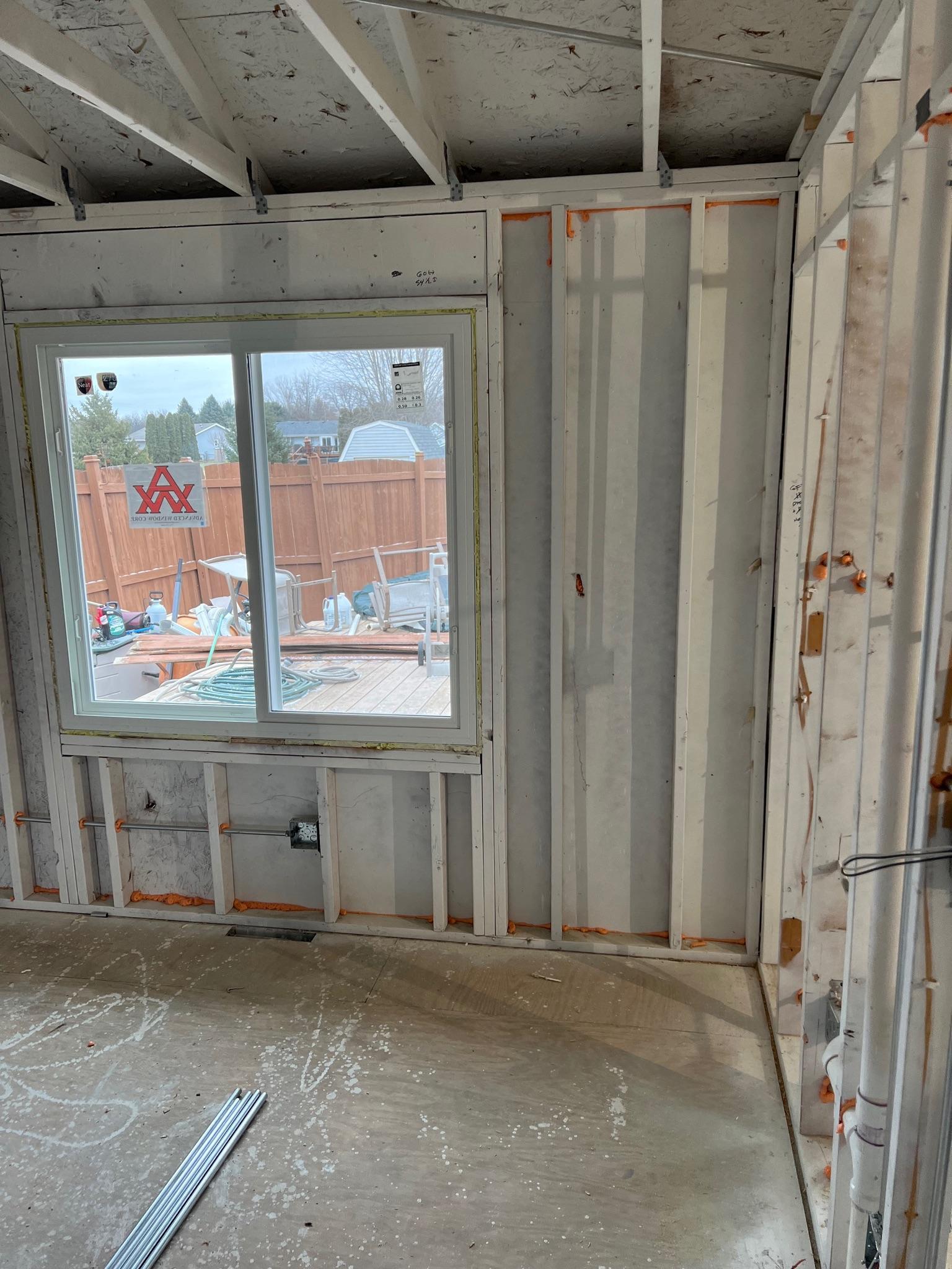 Residential window replacement featuring clean white trim.