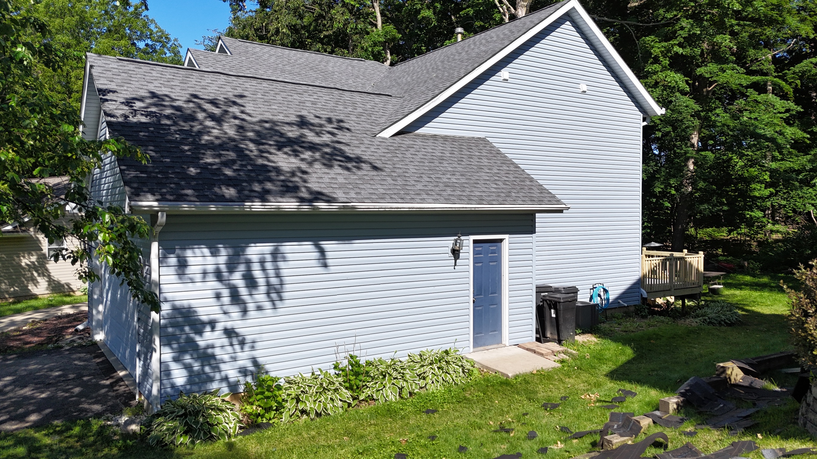 Aerial perspective of a high-quality shingle roof replacement project.