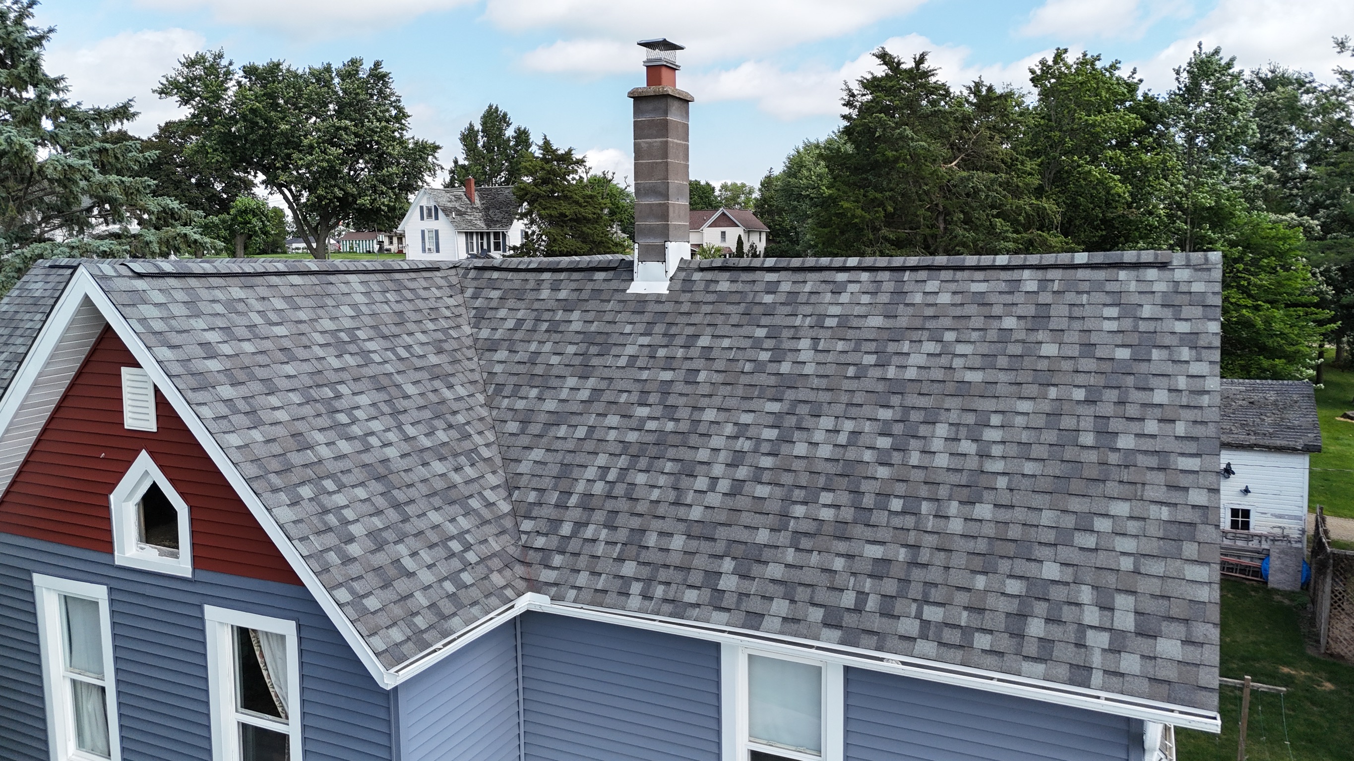 Completed residential asphalt shingle roof replacement by Precision Exteriors Inc.