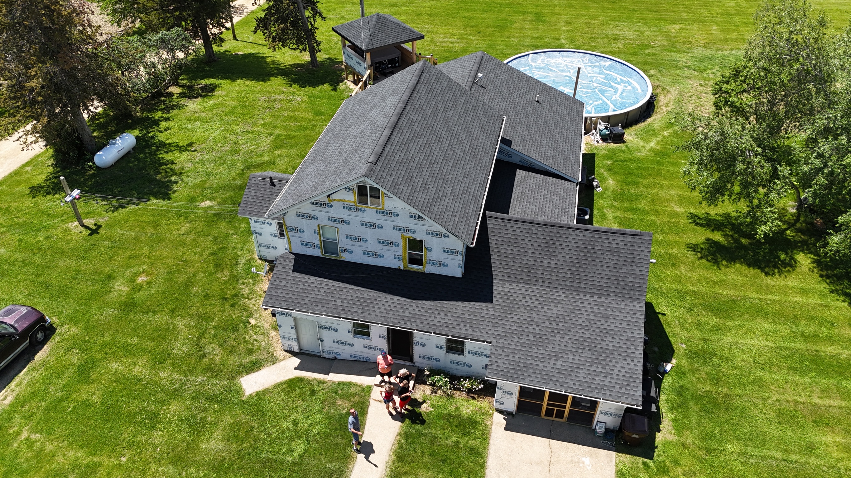 Aerial shot of a beautifully completed home roof replacement project.