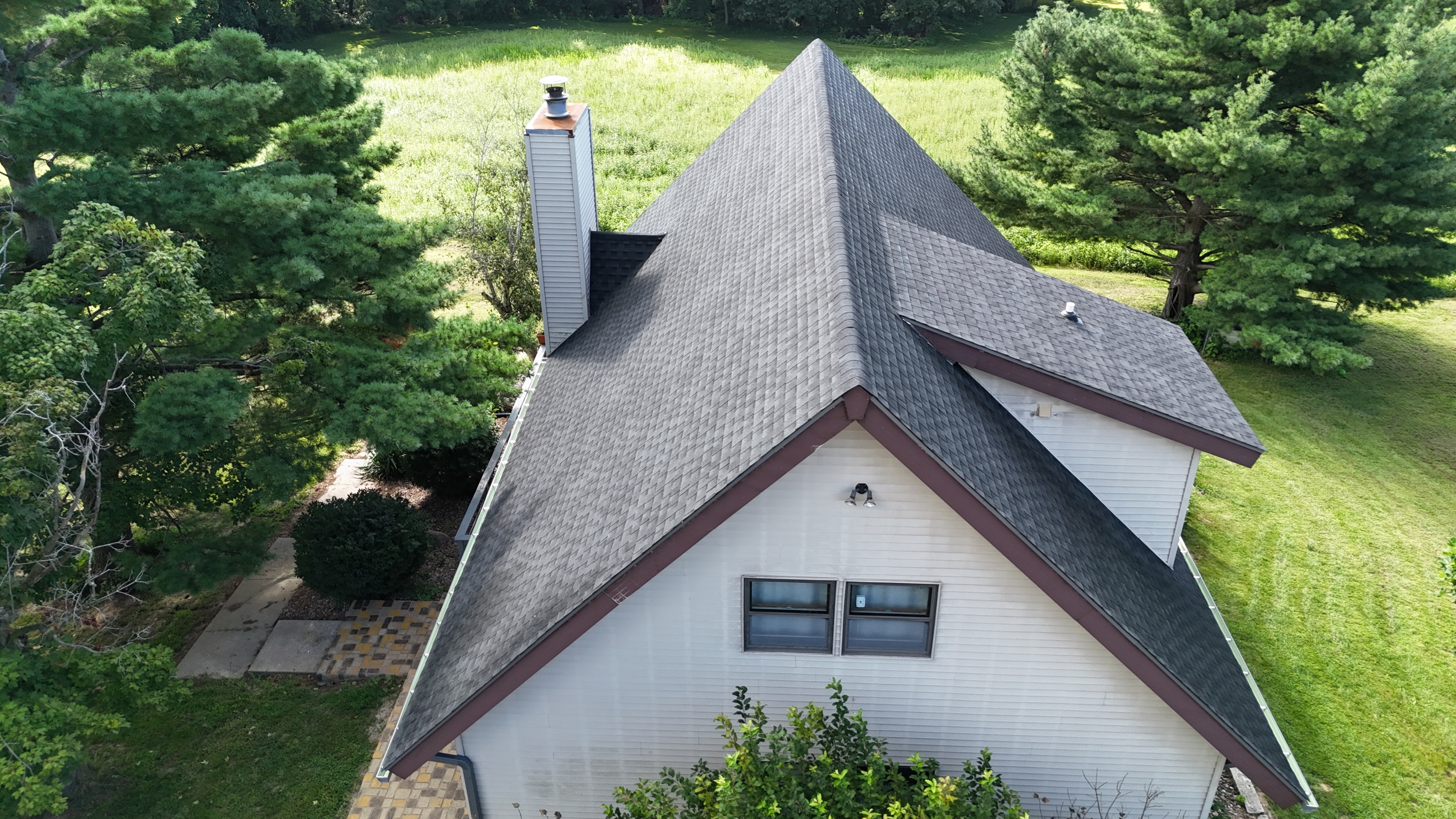 Finished residential roof replacement project by Precision Exteriors Inc.