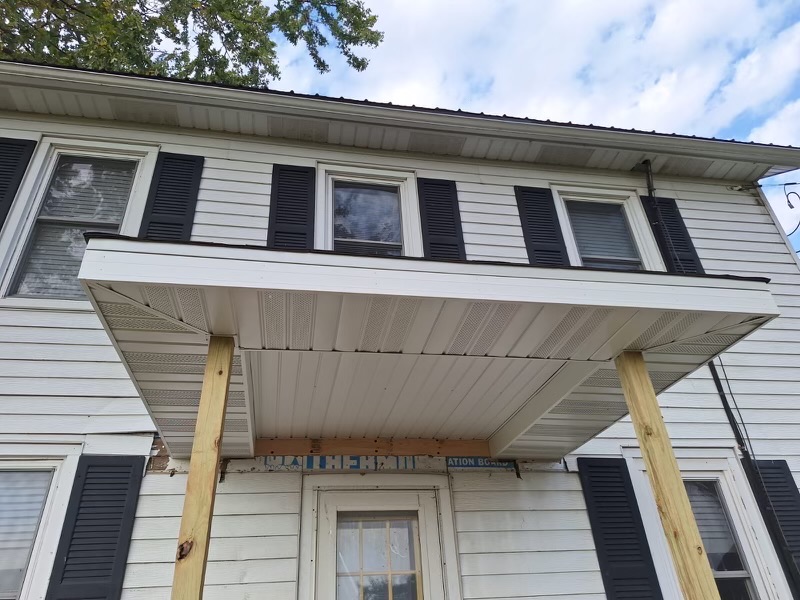 Finished siding and entryway project on a residential house.