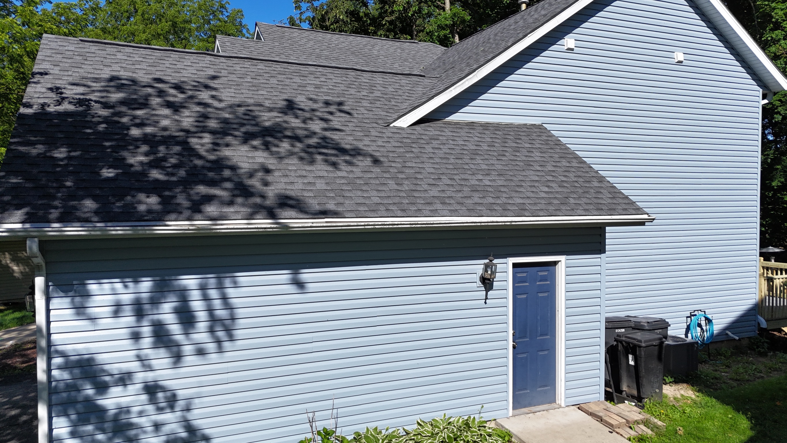 High-quality asphalt shingle roof installation completed by Precision Exteriors Inc.