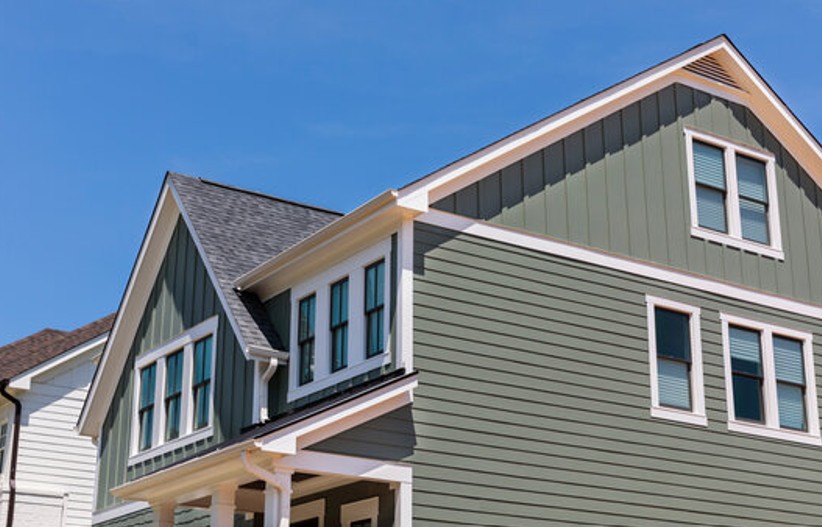 Beautiful multi-level home featuring brand new green siding.