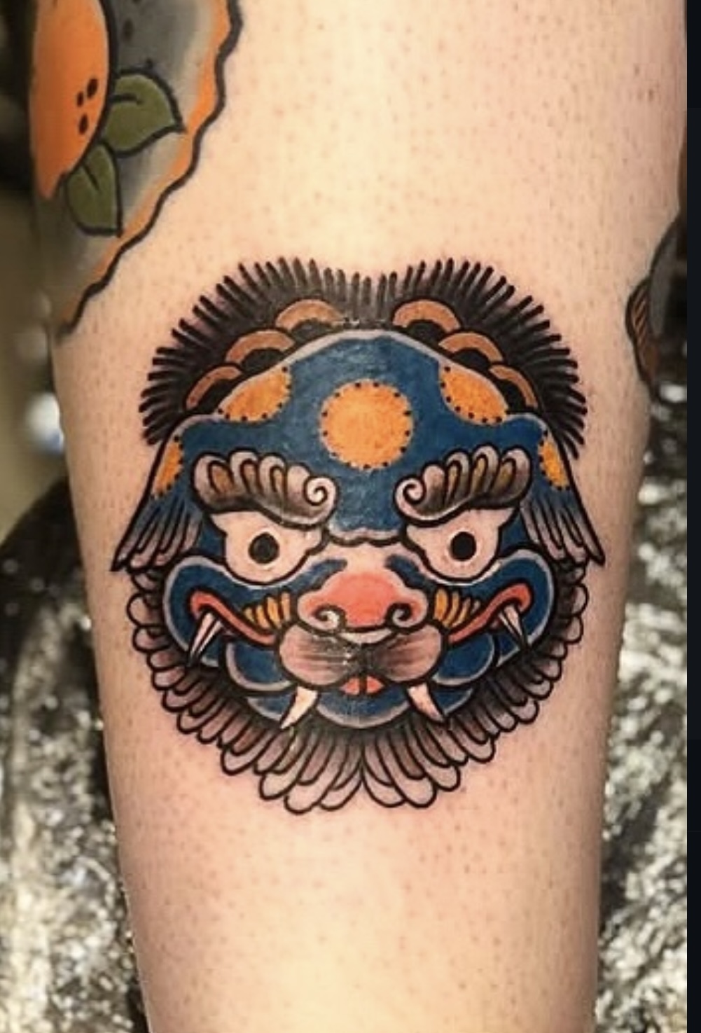 person with tattoo on right arm