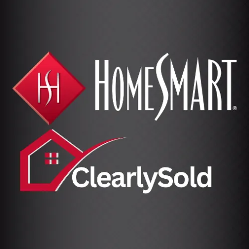 The HomeSmart and ClearlySold logo features a dark gray background with a subtle diamond grid pattern. At the top, there's a red diamond-shaped emblem containing stylized white 'HS' initials. To the right of the diamond, the word 'HomeSmart' appears in tall, sleek white uppercase letters. Below, a red house-shaped icon with a curved roofline includes small red windows on a white background. Next to the house icon, the word 'ClearlySold' is displayed in bold white uppercase and lowercase letters