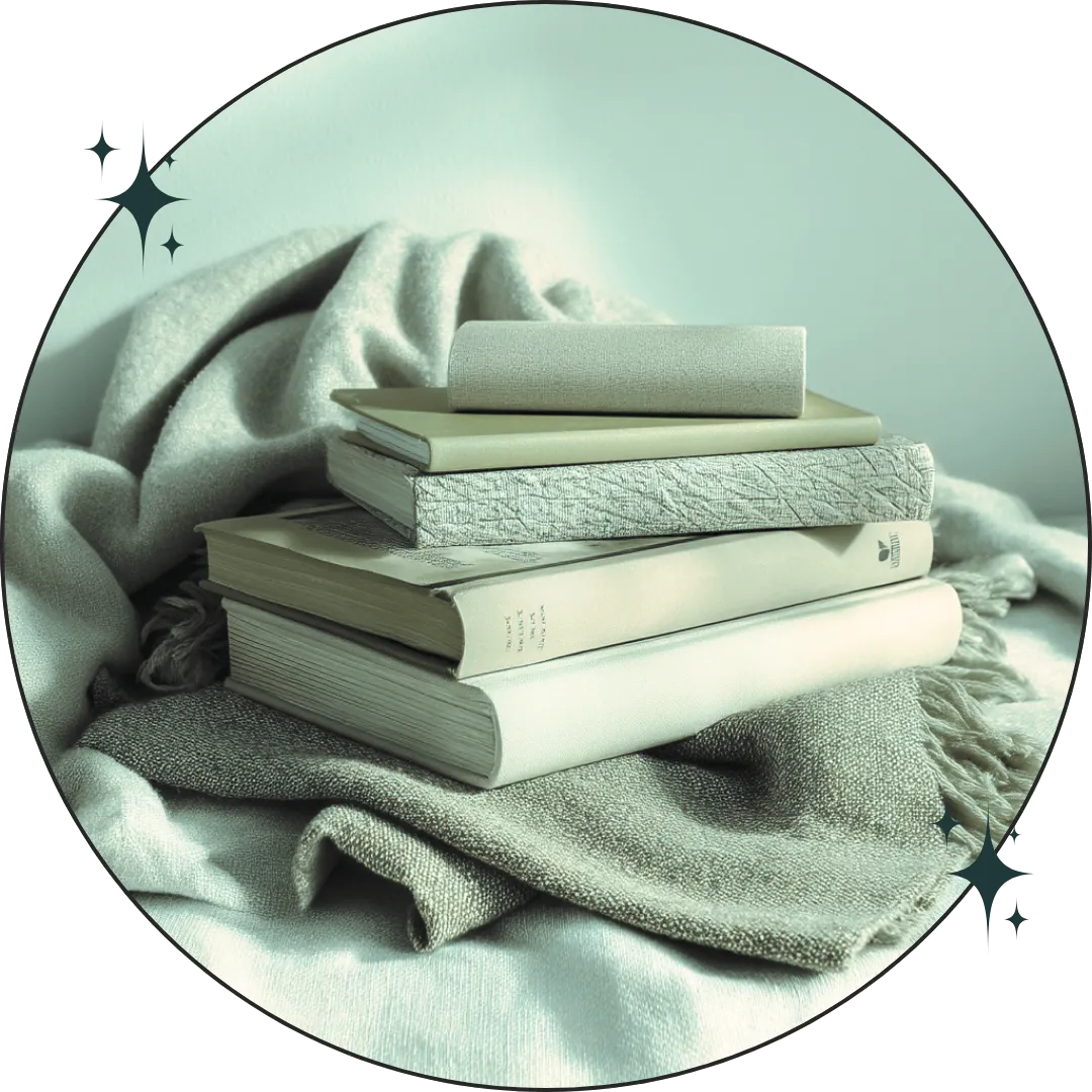 picture of stack of books on a blanket