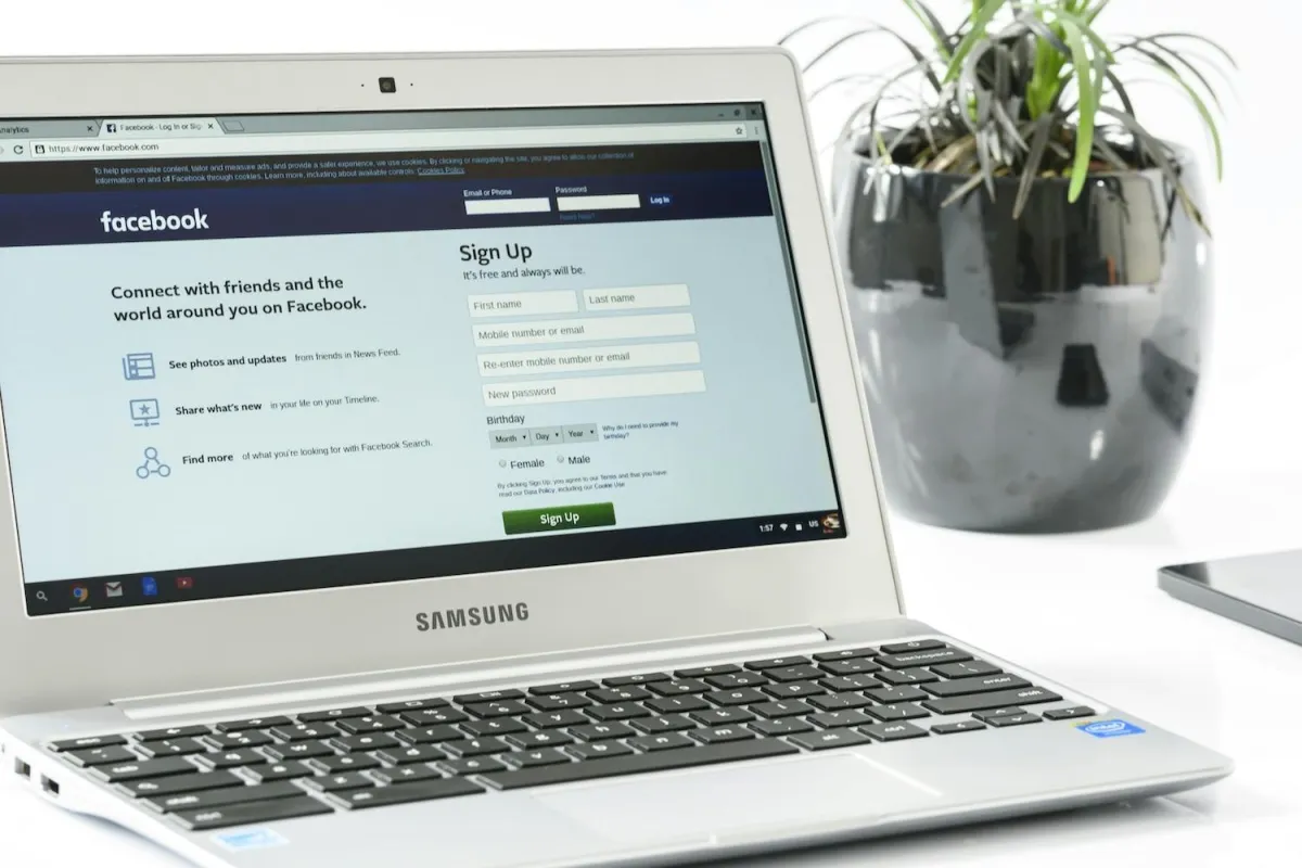 Open laptop show the Facebook login screen